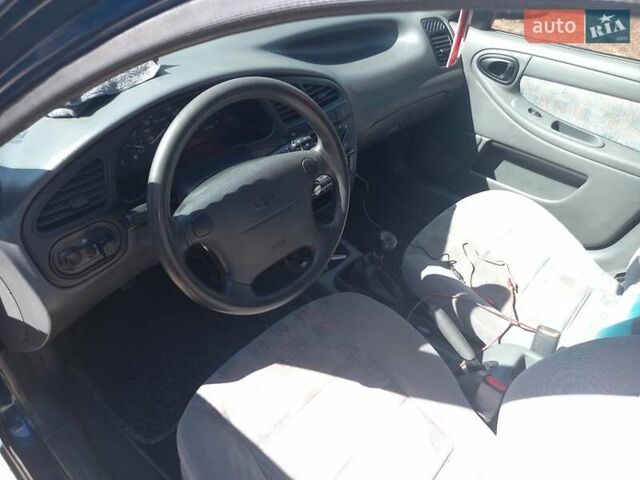 Синий Дэу Ланос, объемом двигателя 1.5 л и пробегом 304 тыс. км за 3500 $, фото 17 на Automoto.ua