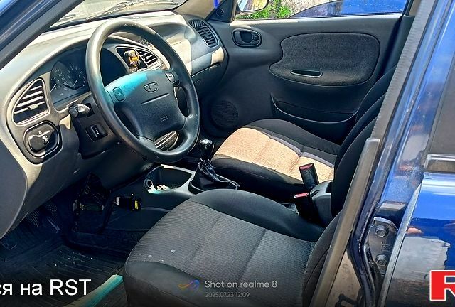 Синий Дэу Ланос, объемом двигателя 1.6 л и пробегом 314 тыс. км за 2700 $, фото 6 на Automoto.ua