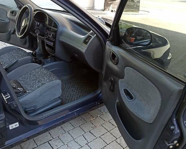 Синий Дэу Ланос, объемом двигателя 1.5 л и пробегом 250 тыс. км за 2400 $, фото 12 на Automoto.ua