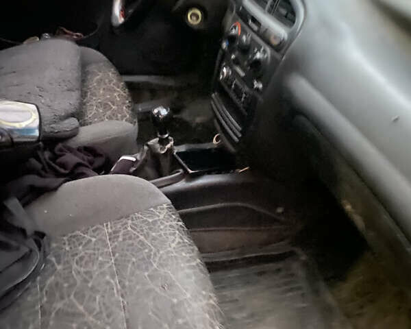 Синий Дэу Ланос, объемом двигателя 0 л и пробегом 200 тыс. км за 1300 $, фото 4 на Automoto.ua