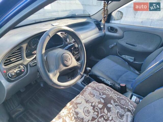 Синий Дэу Ланос, объемом двигателя 1.5 л и пробегом 430 тыс. км за 2500 $, фото 4 на Automoto.ua