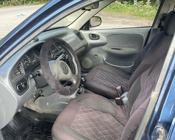Синий Дэу Ланос, объемом двигателя 1.5 л и пробегом 250 тыс. км за 1300 $, фото 2 на Automoto.ua