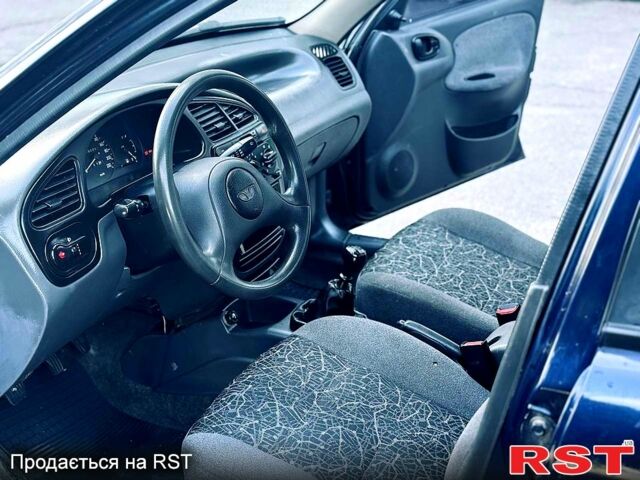 Синий Дэу Ланос, объемом двигателя 1.5 л и пробегом 193 тыс. км за 2000 $, фото 7 на Automoto.ua