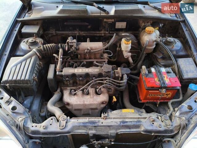 Синій Деу Ланос, об'ємом двигуна 1.5 л та пробігом 204 тис. км за 1950 $, фото 15 на Automoto.ua