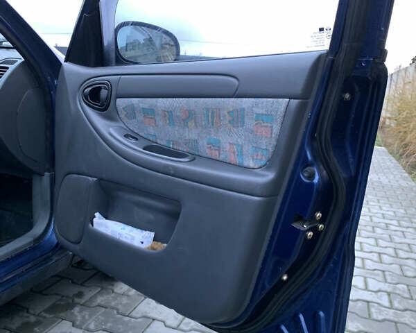 Синій Деу Ланос, об'ємом двигуна 1.5 л та пробігом 233 тис. км за 1500 $, фото 6 на Automoto.ua