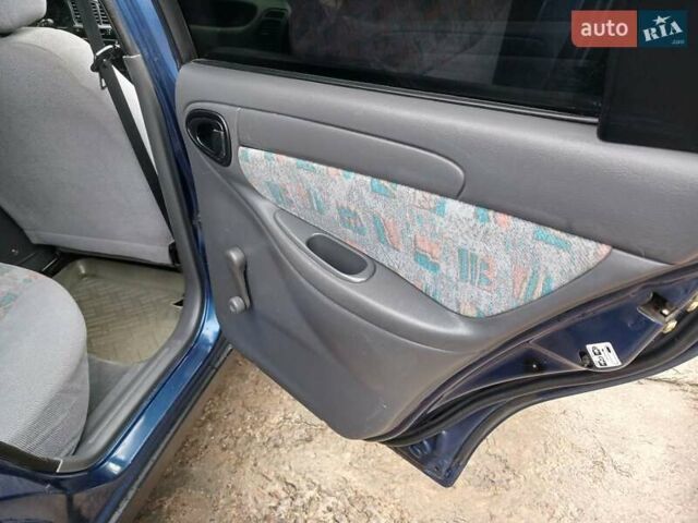 Синий Дэу Ланос, объемом двигателя 1.5 л и пробегом 223 тыс. км за 2199 $, фото 19 на Automoto.ua