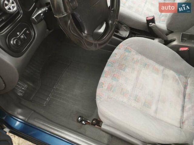 Синий Дэу Ланос, объемом двигателя 1.5 л и пробегом 223 тыс. км за 2199 $, фото 8 на Automoto.ua