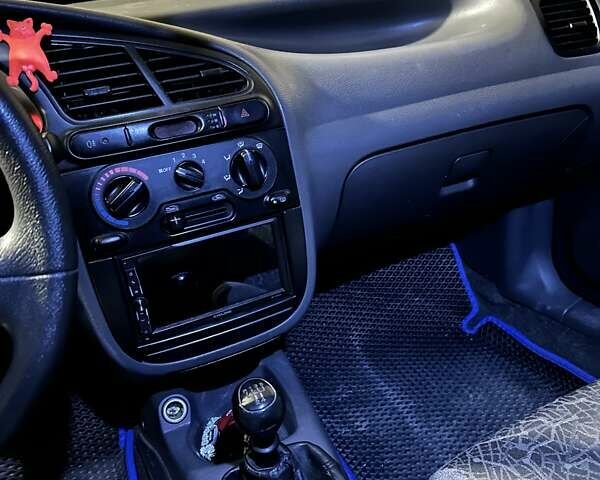 Синий Дэу Ланос, объемом двигателя 1.5 л и пробегом 200 тыс. км за 3500 $, фото 11 на Automoto.ua