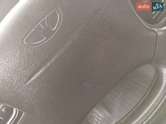 Синий Дэу Ланос, объемом двигателя 1.5 л и пробегом 223 тыс. км за 2199 $, фото 9 на Automoto.ua