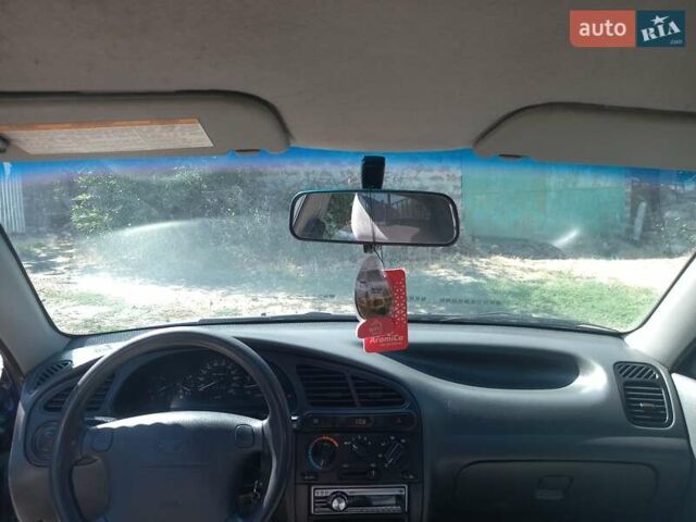 Синий Дэу Ланос, объемом двигателя 1.5 л и пробегом 304 тыс. км за 3500 $, фото 18 на Automoto.ua