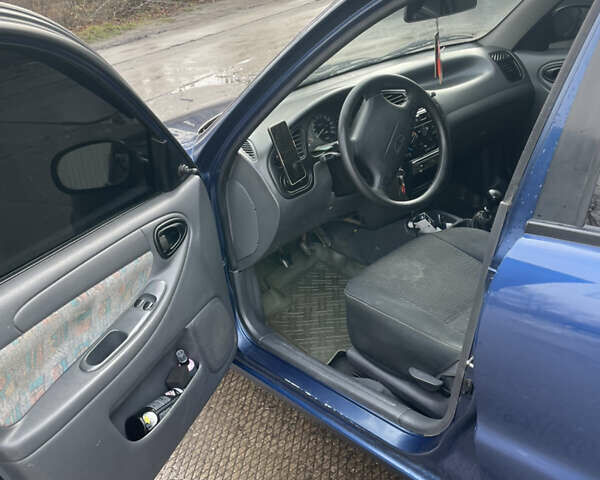 Синий Дэу Ланос, объемом двигателя 1.5 л и пробегом 287 тыс. км за 2500 $, фото 18 на Automoto.ua