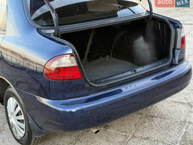 Синій Деу Ланос, об'ємом двигуна 1.5 л та пробігом 201 тис. км за 2850 $, фото 27 на Automoto.ua