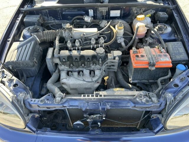 Синий Дэу Ланос, объемом двигателя 1.5 л и пробегом 214 тыс. км за 2500 $, фото 7 на Automoto.ua