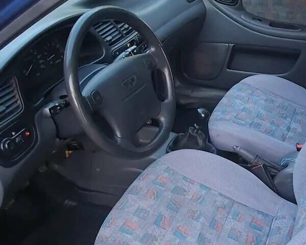 Синий Дэу Ланос, объемом двигателя 1.5 л и пробегом 240 тыс. км за 2650 $, фото 4 на Automoto.ua