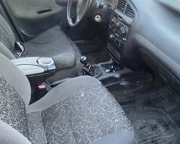 Синій Деу Ланос, об'ємом двигуна 1.5 л та пробігом 110 тис. км за 1300 $, фото 2 на Automoto.ua