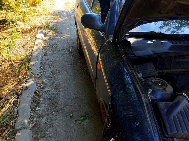 Синий Дэу Ланос, объемом двигателя 1.5 л и пробегом 290 тыс. км за 1200 $, фото 5 на Automoto.ua