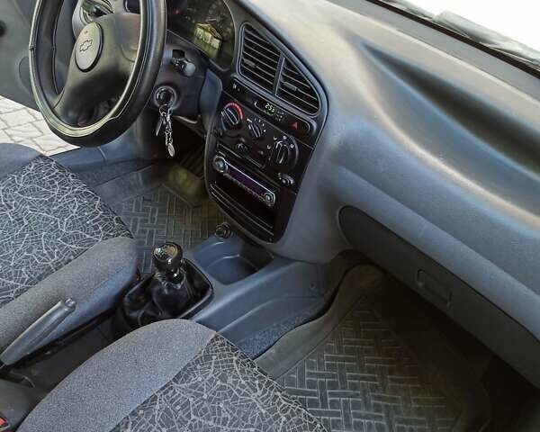 Синий Дэу Ланос, объемом двигателя 1.5 л и пробегом 250 тыс. км за 2400 $, фото 8 на Automoto.ua