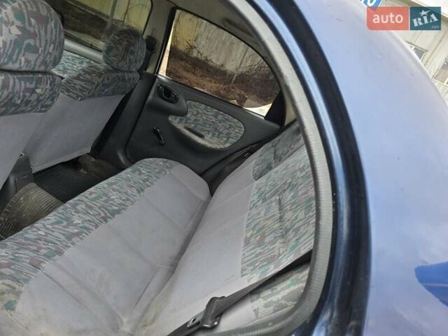 Синий Дэу Ланос, объемом двигателя 1.5 л и пробегом 220 тыс. км за 1515 $, фото 9 на Automoto.ua
