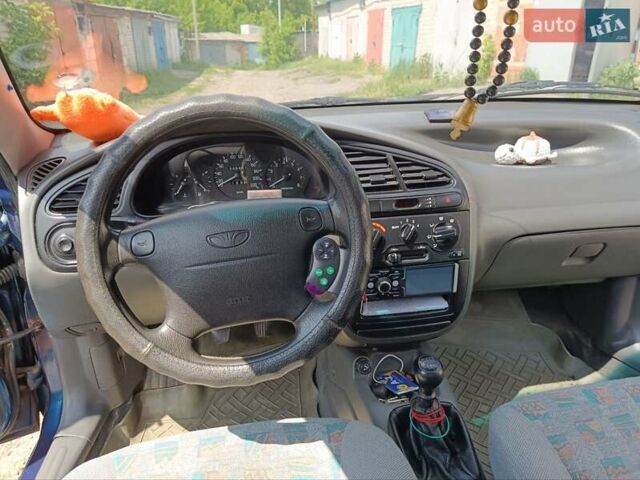 Деу Ланос 2005 у Глухове на Automoto.ua Синій Деу Ланос, об'ємом двигуна 1.5 л та пробігом 251 тис. км за 2900 $, фото 13 на Automoto.ua