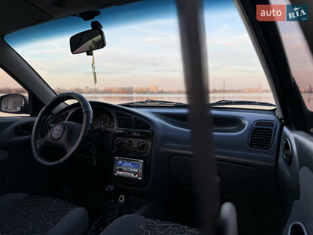 Синій Деу Ланос, об'ємом двигуна 1.5 л та пробігом 201 тис. км за 2850 $, фото 16 на Automoto.ua
