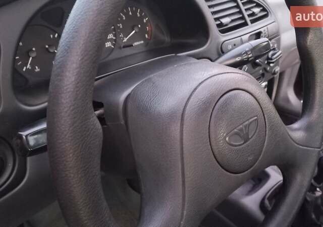 Синій Деу Ланос, об'ємом двигуна 1.5 л та пробігом 140 тис. км за 3300 $, фото 4 на Automoto.ua