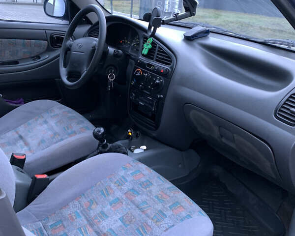 Синій Деу Ланос, об'ємом двигуна 1.5 л та пробігом 233 тис. км за 1500 $, фото 5 на Automoto.ua