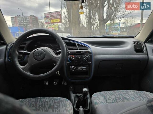 Синий Дэу Ланос, объемом двигателя 1.5 л и пробегом 220 тыс. км за 1515 $, фото 6 на Automoto.ua