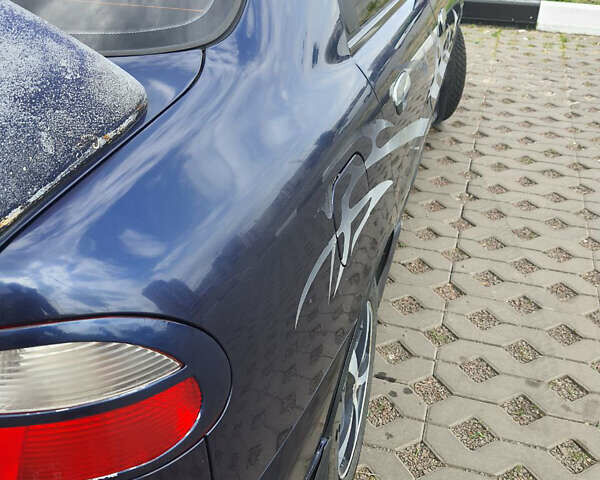 Синій Деу Ланос, об'ємом двигуна 1.3 л та пробігом 157 тис. км за 2050 $, фото 3 на Automoto.ua