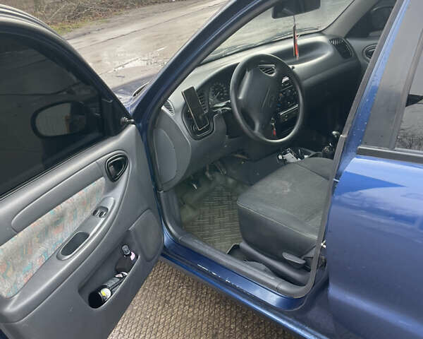 Синий Дэу Ланос, объемом двигателя 1.5 л и пробегом 287 тыс. км за 2500 $, фото 19 на Automoto.ua