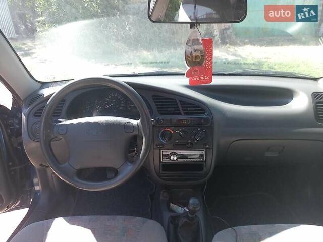 Синий Дэу Ланос, объемом двигателя 1.5 л и пробегом 304 тыс. км за 3500 $, фото 15 на Automoto.ua