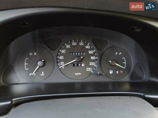 Синій Деу Ланос, об'ємом двигуна 1.5 л та пробігом 204 тис. км за 1950 $, фото 6 на Automoto.ua