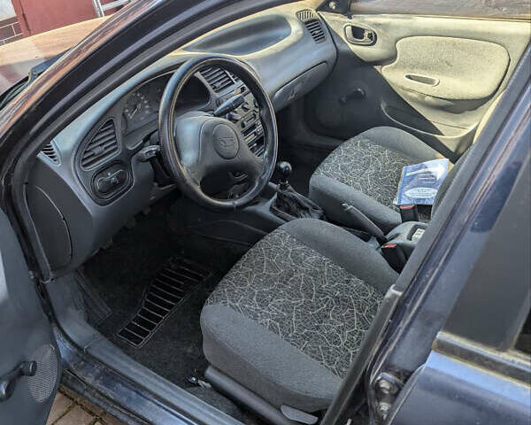 Синій Деу Ланос, об'ємом двигуна 1.5 л та пробігом 228 тис. км за 1500 $, фото 3 на Automoto.ua