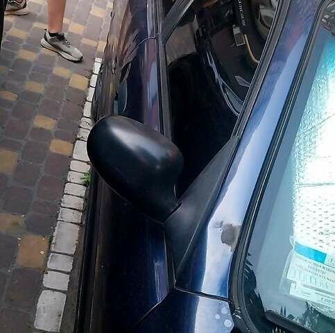 Синий Дэу Ланос, объемом двигателя 1.5 л и пробегом 228 тыс. км за 1650 $, фото 10 на Automoto.ua