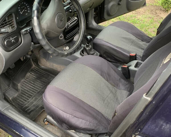 Синий Дэу Ланос, объемом двигателя 1.5 л и пробегом 257 тыс. км за 2000 $, фото 21 на Automoto.ua