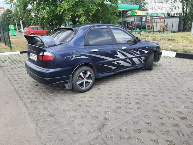 Синій Деу Ланос, об'ємом двигуна 1.3 л та пробігом 157 тис. км за 2050 $, фото 7 на Automoto.ua