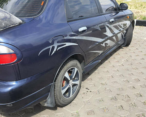 Синій Деу Ланос, об'ємом двигуна 1.3 л та пробігом 157 тис. км за 2050 $, фото 15 на Automoto.ua