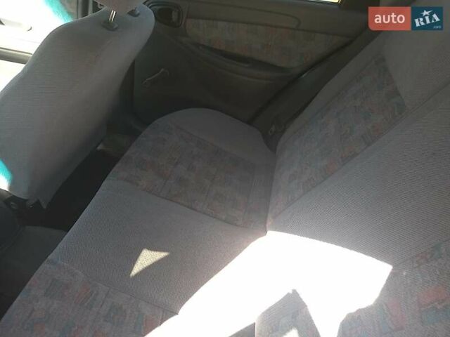 Синий Дэу Ланос, объемом двигателя 1.5 л и пробегом 304 тыс. км за 3500 $, фото 12 на Automoto.ua