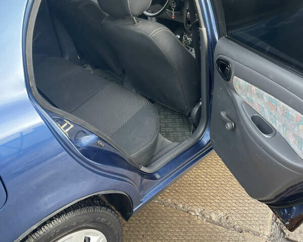 Синий Дэу Ланос, объемом двигателя 1.5 л и пробегом 287 тыс. км за 2500 $, фото 13 на Automoto.ua