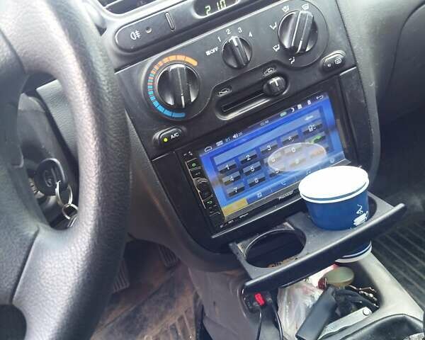 Синий Дэу Ланос, объемом двигателя 1.5 л и пробегом 274 тыс. км за 3200 $, фото 4 на Automoto.ua