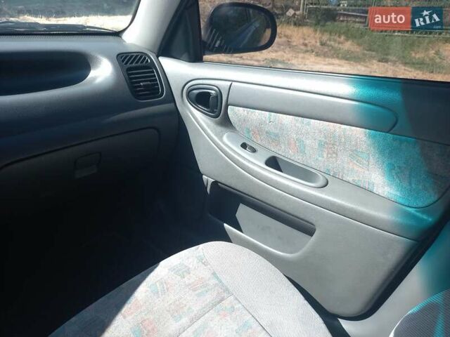 Синий Дэу Ланос, объемом двигателя 1.5 л и пробегом 304 тыс. км за 3500 $, фото 16 на Automoto.ua