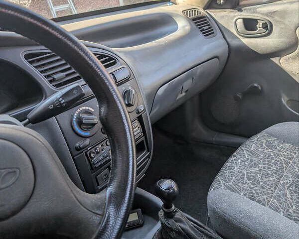 Синій Деу Ланос, об'ємом двигуна 1.5 л та пробігом 228 тис. км за 1500 $, фото 6 на Automoto.ua