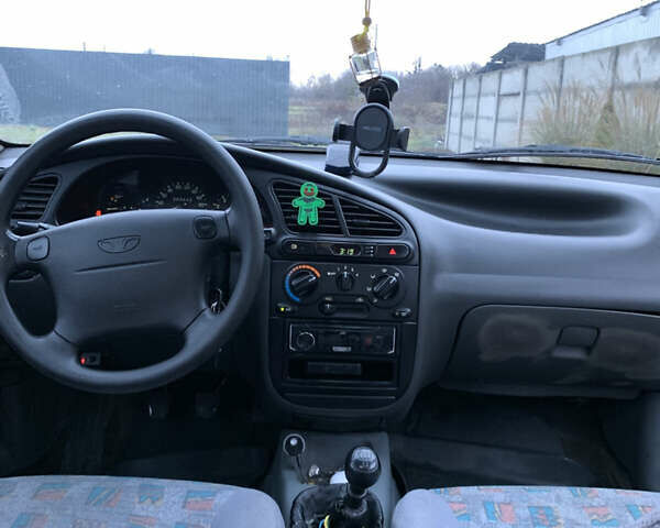 Синій Деу Ланос, об'ємом двигуна 1.5 л та пробігом 233 тис. км за 1500 $, фото 13 на Automoto.ua