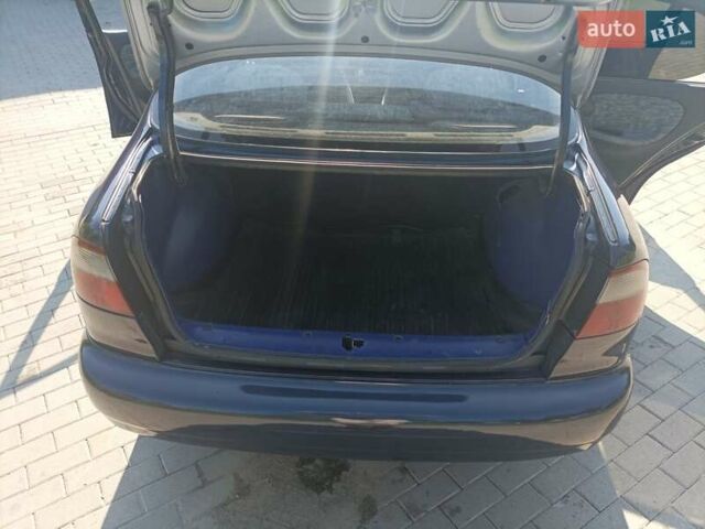 Синий Дэу Ланос, объемом двигателя 1.5 л и пробегом 224 тыс. км за 1999 $, фото 5 на Automoto.ua