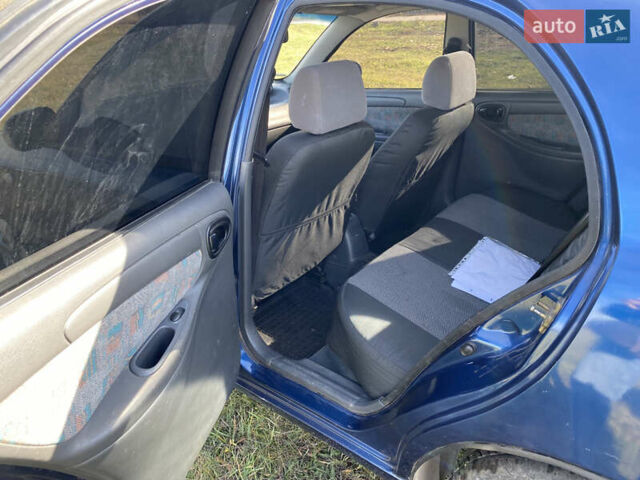 Деу Ланос 2005 у Полтаві на Automoto.ua Синій Деу Ланос, об'ємом двигуна 1.6 л та пробігом 2 тис. км за 2800 $, фото 8 на Automoto.ua