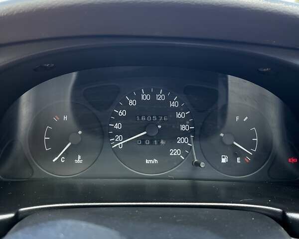 Синий Дэу Ланос, объемом двигателя 1.5 л и пробегом 166 тыс. км за 2500 $, фото 2 на Automoto.ua