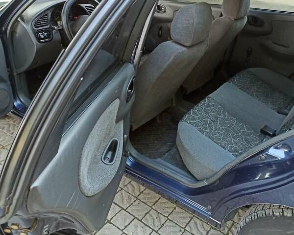 Синий Дэу Ланос, объемом двигателя 1.5 л и пробегом 250 тыс. км за 2400 $, фото 15 на Automoto.ua