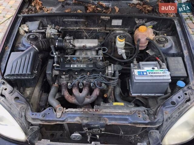 Синий Дэу Ланос, объемом двигателя 1.5 л и пробегом 345 тыс. км за 1550 $, фото 4 на Automoto.ua