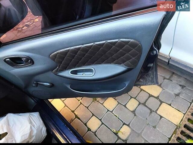 Синий Дэу Ланос, объемом двигателя 1.5 л и пробегом 228 тыс. км за 1650 $, фото 15 на Automoto.ua