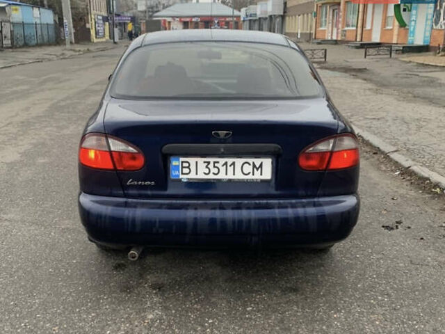 Синий Дэу Ланос, объемом двигателя 1.5 л и пробегом 257 тыс. км за 2000 $, фото 4 на Automoto.ua
