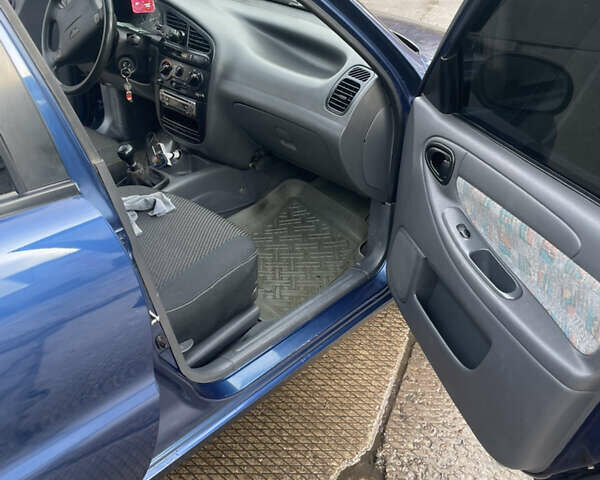 Синий Дэу Ланос, объемом двигателя 1.5 л и пробегом 287 тыс. км за 2500 $, фото 15 на Automoto.ua